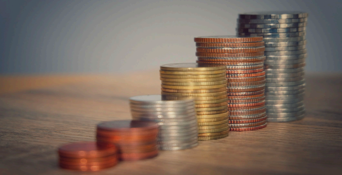 piles of different currency coins