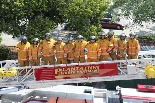 firefighters on ladder